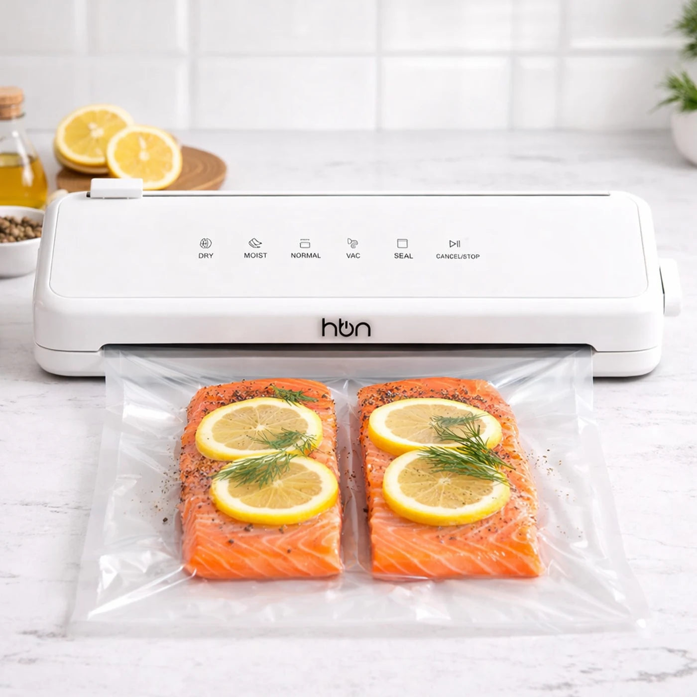 vacuum sealer sealing salmon fillets in plastic bag for food preservation
