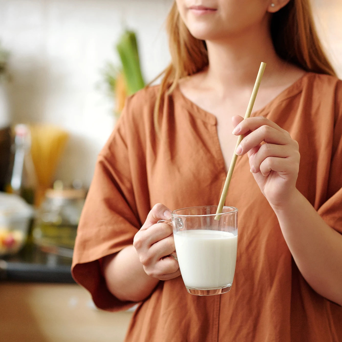 drinking fresh nut milk made with nut milk maker healthy lifestyle drink