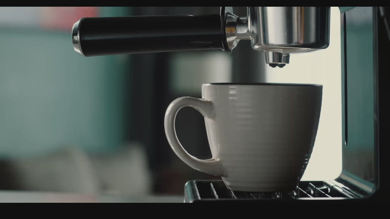 espresso coffee machine brewing rich coffee into cup home barista experience