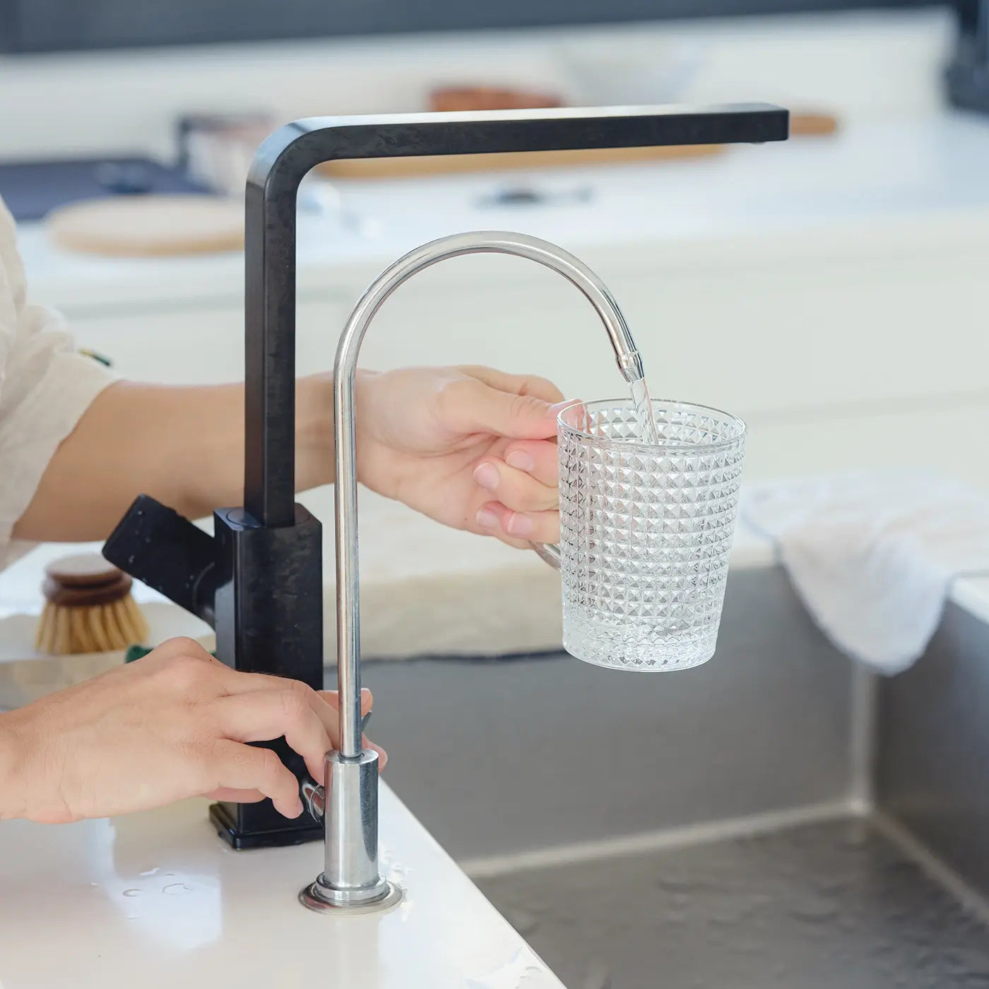 reverse osmosis system providing clean drinking water from kitchen faucet